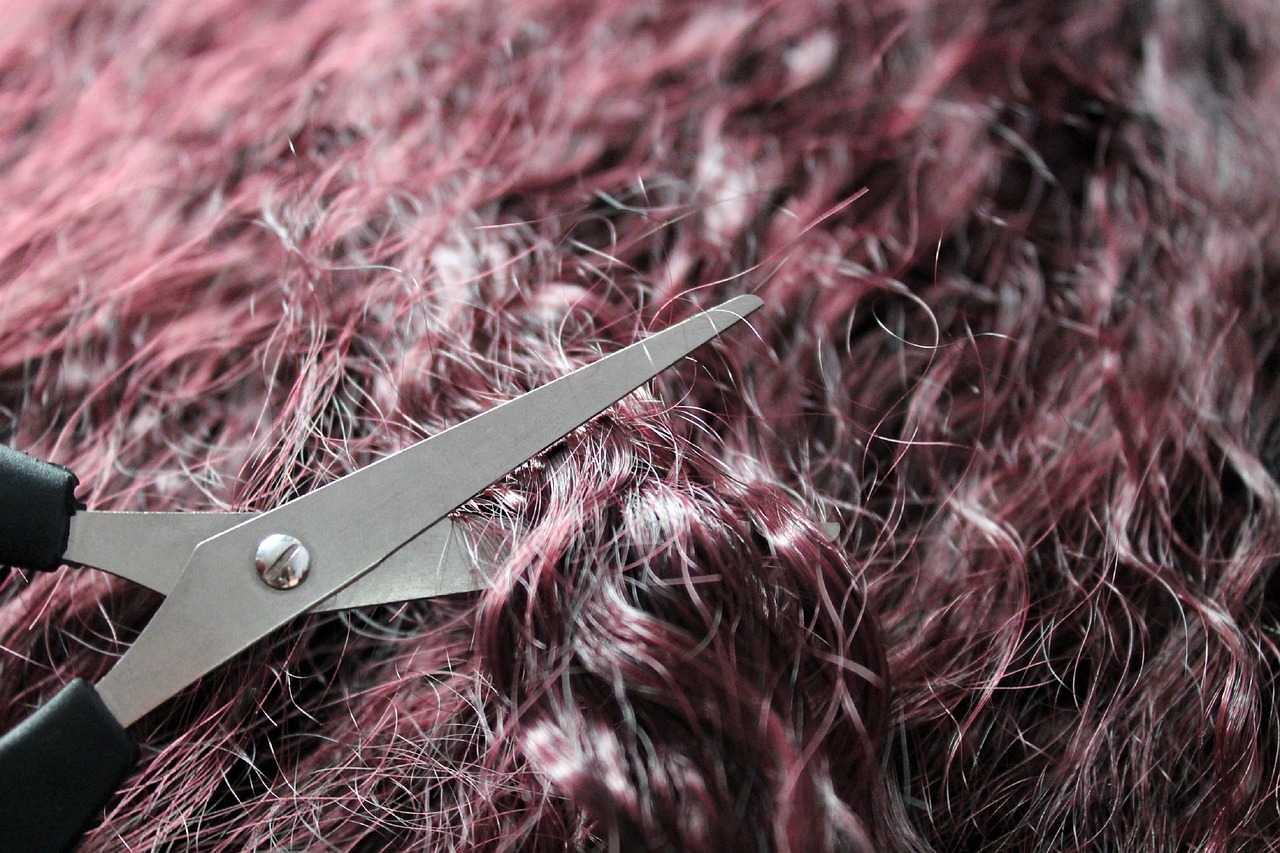 A polished hair-salon styling detail in the Sable salon register.